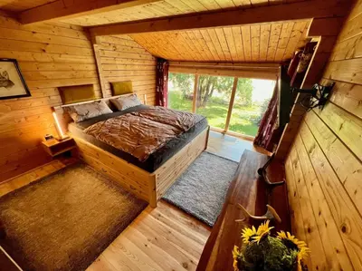 Ein Bett oder Betten in einem Zimmer der Unterkunft Jagdhaus zum Waldblick