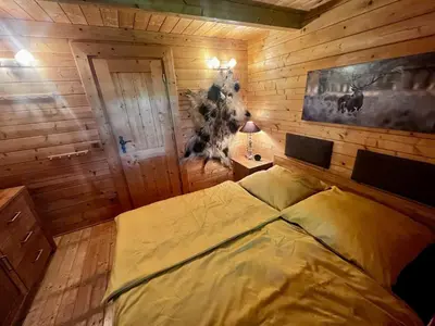 Ein Bett oder Betten in einem Zimmer der Unterkunft Jagdhaus zum Waldblick