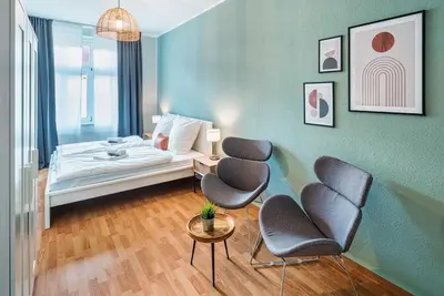 Ein Bett oder Betten in einem Zimmer der Unterkunft cozy Apartment -Kerner- in Meißen mit MagentaPlus