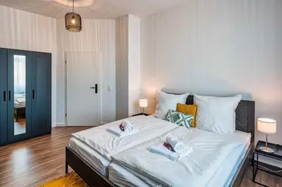 Ein Bett oder Betten in einem Zimmer der Unterkunft cozy Apartment -Traminer- mit MagentaPlus