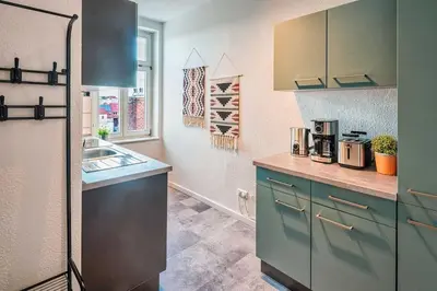 Küche/Küchenzeile in der Unterkunft cozy Apartment -Traminer- mit MagentaPlus