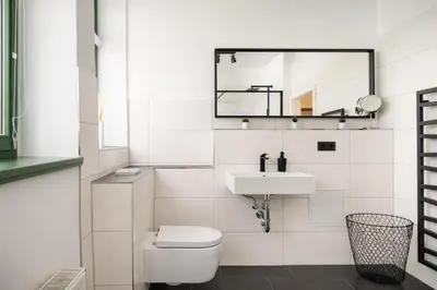Ein Badezimmer in der Unterkunft Loft Altstadt mit Sandstein Gewölbe und Parkplatz