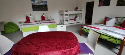 Ein Bett oder Betten in einem Zimmer der Unterkunft zu den blauen Schwertern
