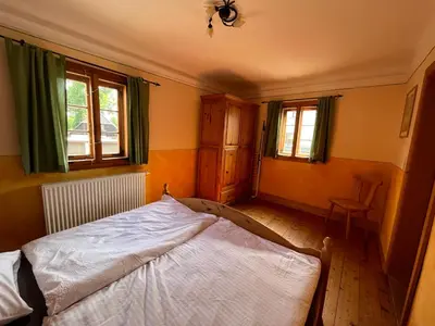 Ein Bett oder Betten in einem Zimmer der Unterkunft Ferienwohnung im Erzgebirge