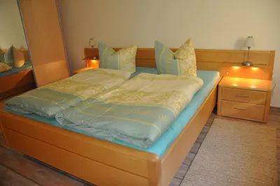 Ein Bett oder Betten in einem Zimmer der Unterkunft Ferienwohnung an der Elbe
