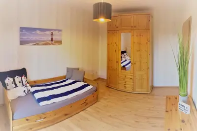 Ein Bett oder Betten in einem Zimmer der Unterkunft Haus-Am-See-Pratzschwitz