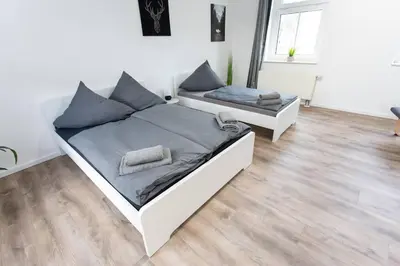 Ein Sitzbereich in der Unterkunft Schickes 1-Raum-Apartment mit Balkon und vollausgestatteter Küche