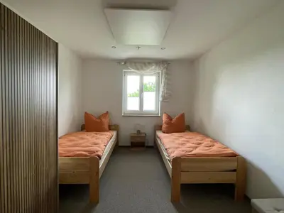 Ein Bett oder Betten in einem Zimmer der Unterkunft Pension Böhmer