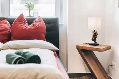 Ein Bett oder Betten in einem Zimmer der Unterkunft Stilvolle 4-Raumwohnung in zentraler Lage