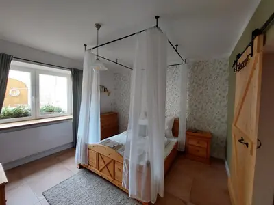 Ein Bett oder Betten in einem Zimmer der Unterkunft NEU! Ferienwohnung Böhlitz Neun