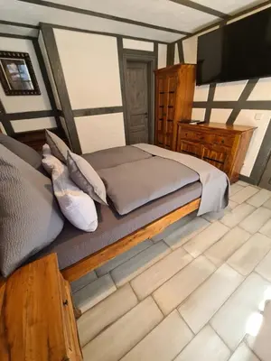 Ein Bett oder Betten in einem Zimmer der Unterkunft Hotel b&b altes hinterhäusel
