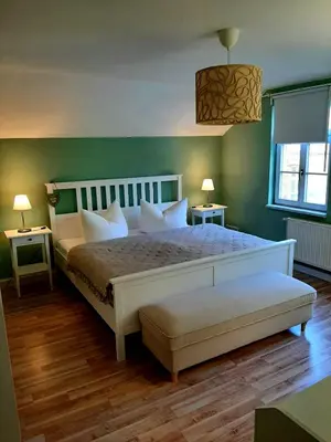 Ein Bett oder Betten in einem Zimmer der Unterkunft Glashüttchen mit 2 Schlafzimmern, Sauna und schönem Garten