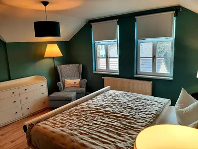 Ein Bett oder Betten in einem Zimmer der Unterkunft Glashüttchen mit 2 Schlafzimmern, Sauna und schönem Garten
