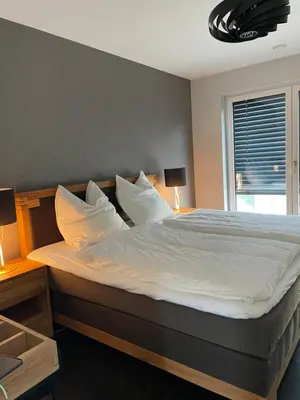 Ein Bett oder Betten in einem Zimmer der Unterkunft Luxury/Urban Penthouse