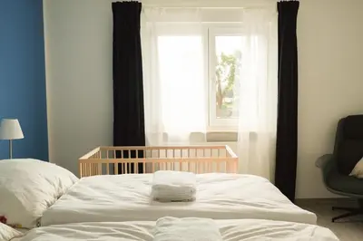 Ein Bett oder Betten in einem Zimmer der Unterkunft Haus Hummel Ferienwohnung Anne