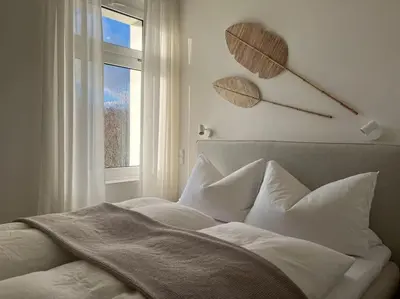 Ein Bett oder Betten in einem Zimmer der Unterkunft Wohlfühl-Apartment am Paradiesberg