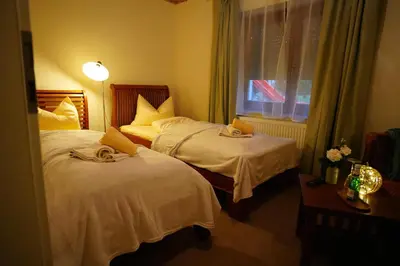 Ein Bett oder Betten in einem Zimmer der Unterkunft Pension Zum historischen Kalkwerk