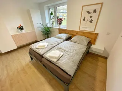 Ein Bett oder Betten in einem Zimmer der Unterkunft Haus Wehlen