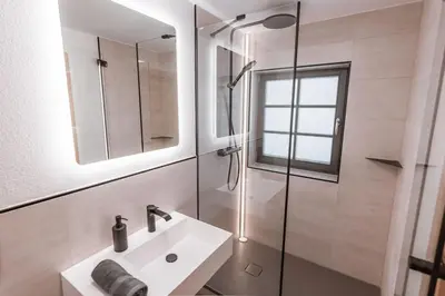 Ein Badezimmer in der Unterkunft Zugspitze Apartment GLÜCK.AUF