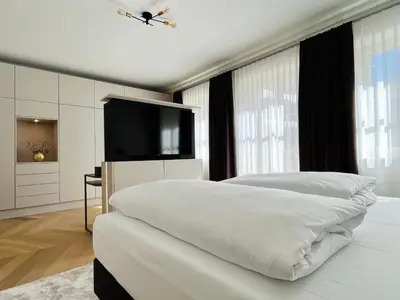 Ein Bett oder Betten in einem Zimmer der Unterkunft Luxury Home / 2-Raum-Apartment an der Frauenkirche