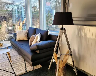 Ein Sitzbereich in der Unterkunft Appartment Düne 6