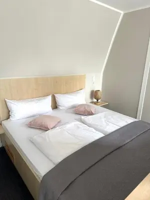 Ein Bett oder Betten in einem Zimmer der Unterkunft Appartment Düne 6
