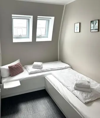 Ein Bett oder Betten in einem Zimmer der Unterkunft Appartment Seeblick 4