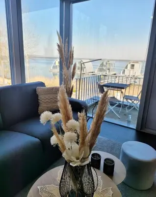 Ein Sitzbereich in der Unterkunft Appartment Seeblick 5
