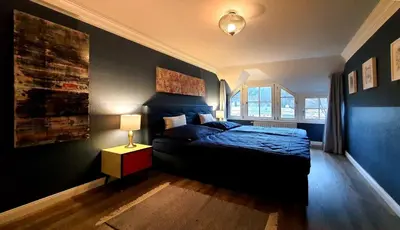 Ein Bett oder Betten in einem Zimmer der Unterkunft ArtHouse Bad Schandau