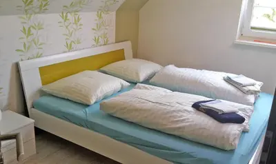 Ein Bett oder Betten in einem Zimmer der Unterkunft Countryside-Lovers - Ganzes Haus 100m² für euch allein mit Garten