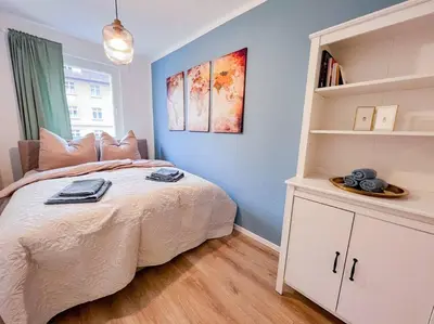 Ein Bett oder Betten in einem Zimmer der Unterkunft Ferienwohnung 4 Personen *Parkplatz, WLAN, Waschmaschine*