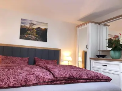 Ein Bett oder Betten in einem Zimmer der Unterkunft Amselgarten