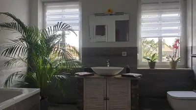 Ein Badezimmer in der Unterkunft SeenSucht & Urlaubsträume, Ferienwohnung 
