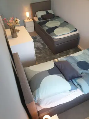 Ein Bett oder Betten in einem Zimmer der Unterkunft Apartment am Hochwald