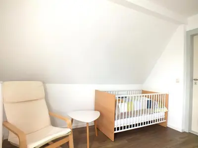 Ein Bett oder Betten in einem Zimmer der Unterkunft Family Escape in Lichtenau