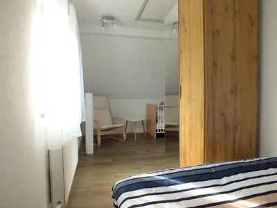 Ein Bett oder Betten in einem Zimmer der Unterkunft Family Escape in Lichtenau
