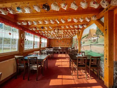 Ein Restaurant oder anderes Speiselokal in der Unterkunft Pension Zum Erzgebirge