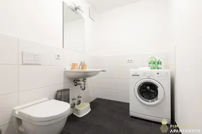 Ein Badezimmer in der Unterkunft PINEAPPLE APARTMENTS - Zwinger VII - 78qm - 1x free parking