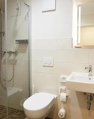 Ein Badezimmer in der Unterkunft Pension 