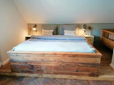 Ein Bett oder Betten in einem Zimmer der Unterkunft Haus Sandstein Glück Biedermann
