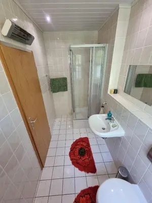 Ein Badezimmer in der Unterkunft Parkvilla Bad Lausick
